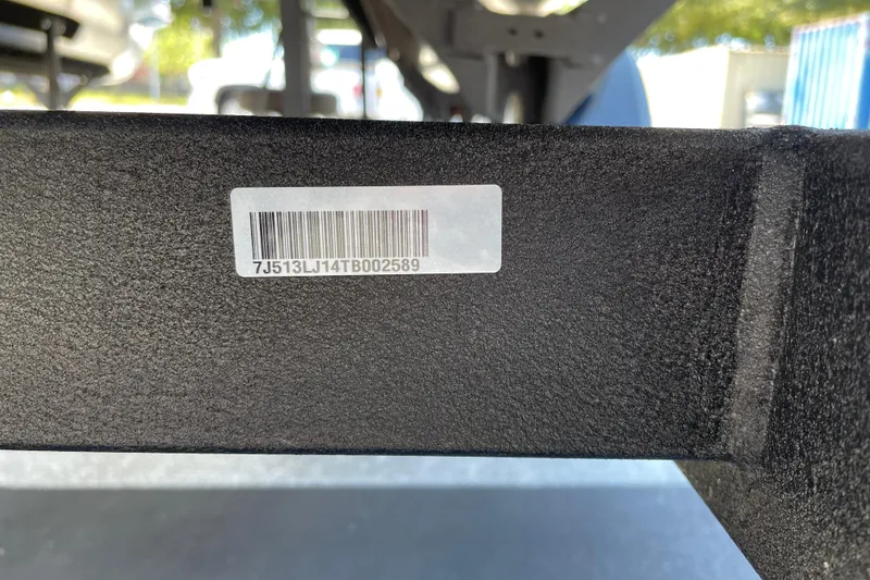 Slide: The Image of Barcode sticker on a 2026 Sun Tracker Bass Buggy 16 XL Select boat trailer. - 105