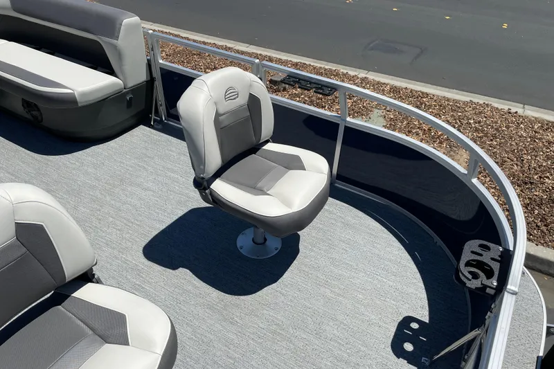 Slide: The Image of 2026 Sun Tracker Bass Buggy 16 XL Select pontoon boat interior with seating and railing. - 5