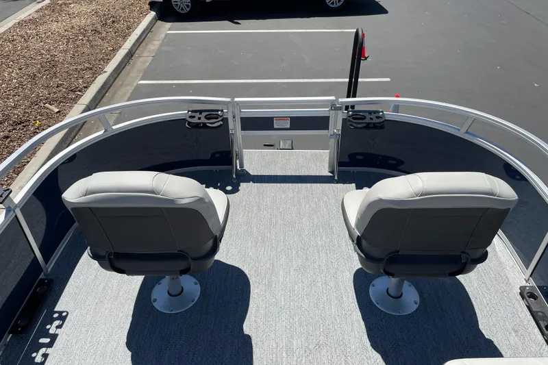 Slide: The Image of 2026 Sun Tracker Bass Buggy 16 XL Select pontoon boat with two swivel seats. - 9
