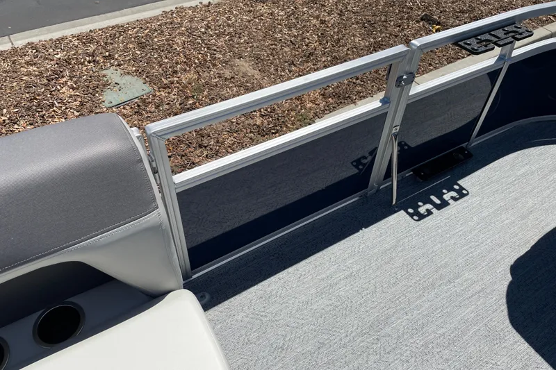 Slide: The Image of 2026 Sun Tracker Bass Buggy 16 XL Select pontoon boat interior with seating and railing. - 10
