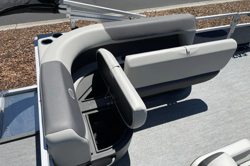 Slide: The Image of 2026 Sun Tracker Bass Buggy 16 XL Select boat seating with storage compartment. - 13