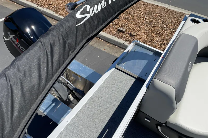 Slide: The Image of 2026 Sun Tracker Bass Buggy 16 XL Select boat interior with seating and motor cover. - 26