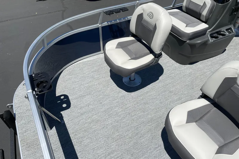 Slide: The Image of 2026 Sun Tracker Bass Buggy 16 XL Select pontoon boat interior with seating. - 6