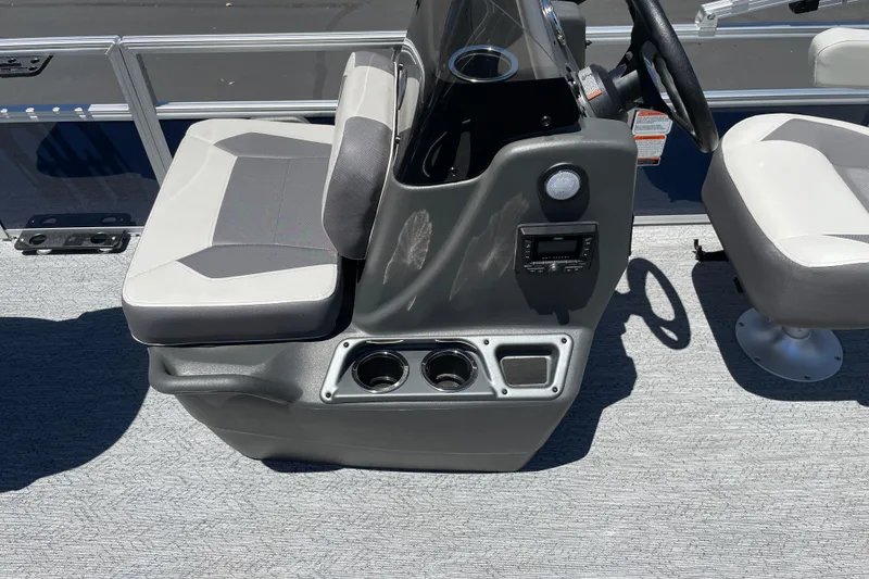 Slide: The Image of 2026 Sun Tracker Bass Buggy 16 XL Select boat interior with seating and console. - 30