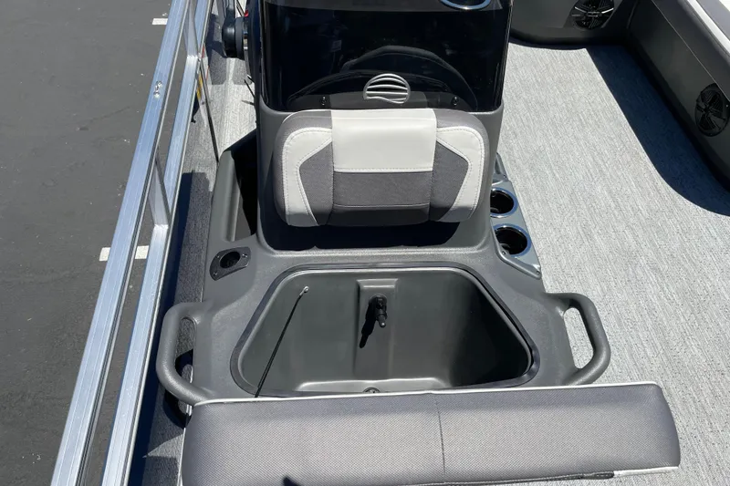 Slide: The Image of 2026 Sun Tracker Bass Buggy 16 XL Select boat interior with seating and storage. - 23