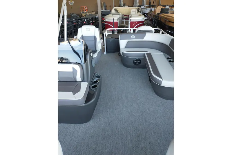Slide: The Image of 2026 Sun Tracker Bass Buggy 18 DLX interior with spacious seating and modern design. - 8