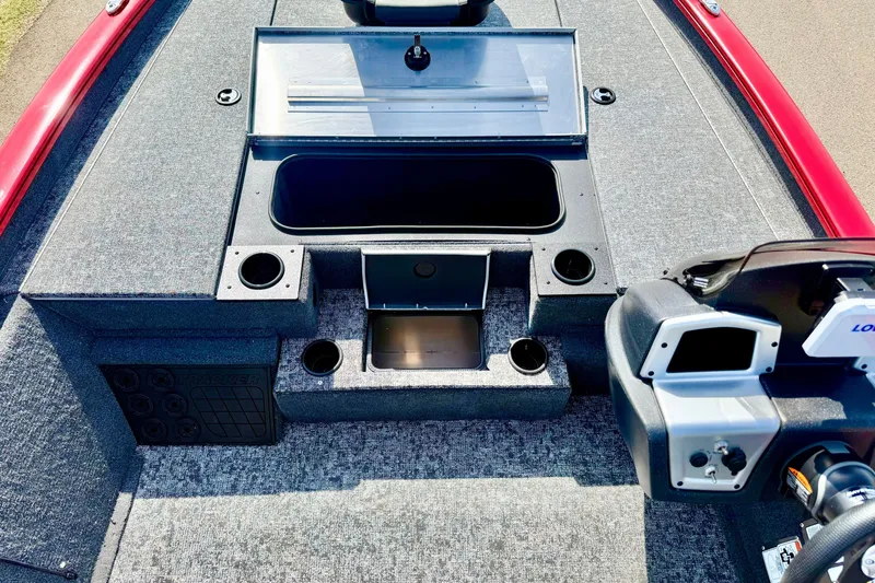 Slide: The Image of 2026 Tracker Pro Team 195 boat interior with storage compartments and control panel. - 59