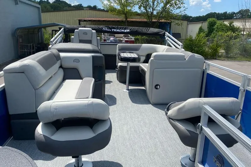Slide: The Image of 2026 Sun Tracker Fishin' Barge 20 DLX with spacious seating and modern design. - 8