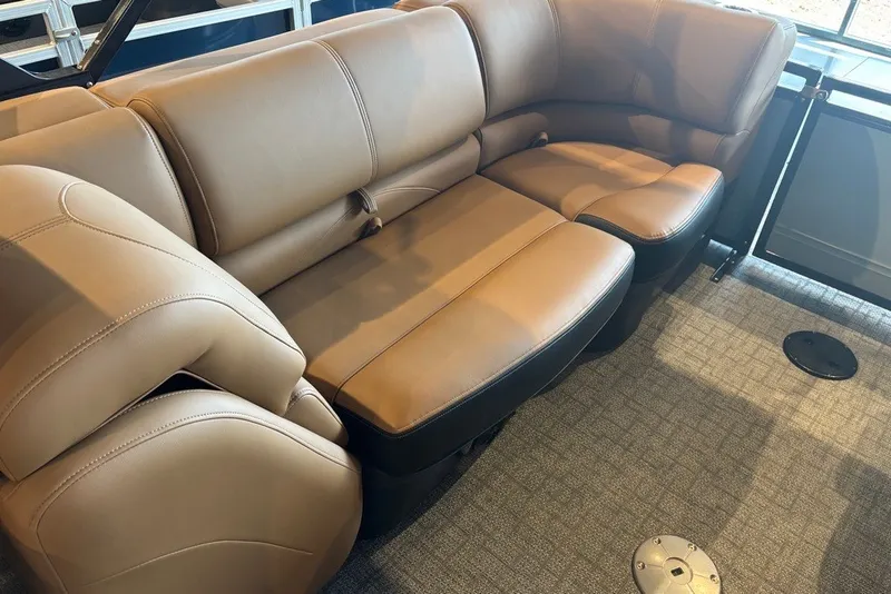 Slide: The Image of Luxurious tan seating in 2026 Regency 250 DL boat interior. - 6