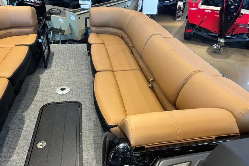 Slide: The Image of Luxurious seating on 2026 Regency 250 DL boat with tan upholstery and modern design. - 12