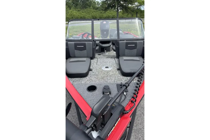Slide: The Image of 2026 Tracker Pro Guide V-175 Combo boat interior with seating and equipment. - 2