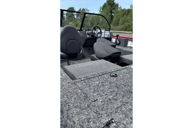 Slide: The Image of Interior view of 2026 Tracker Pro Guide V-175 Combo boat with seating and dashboard. - 4