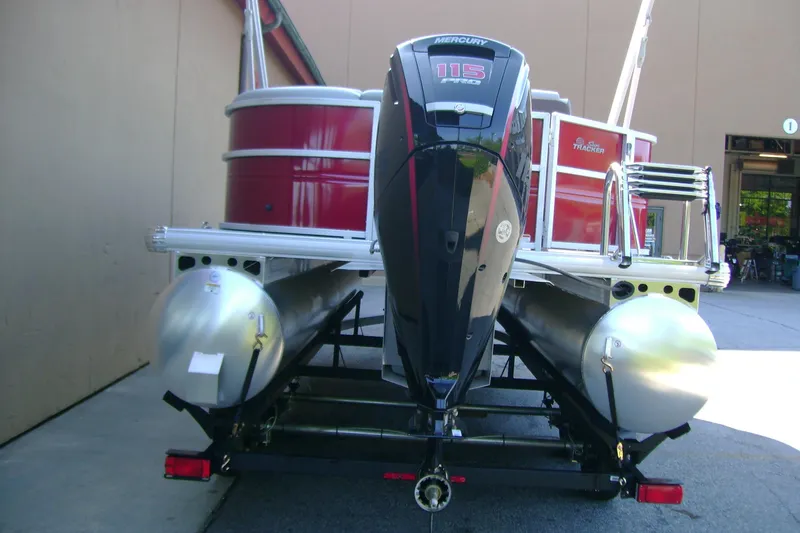 Slide: The Image of 2026 Sun Tracker Party Barge 20 DLX with Mercury 115 engine, rear view. - 4
