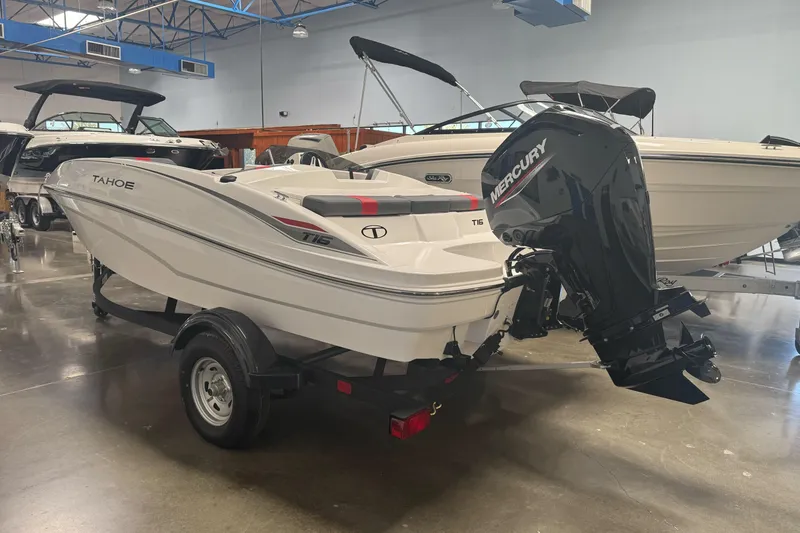 Slide: The Image of 2026 Tahoe T16 boat with Mercury outboard motor in showroom. - 3