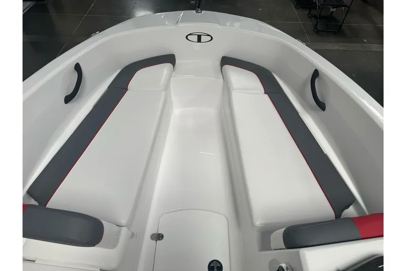 Slide: The Image of 2026 Tahoe T16 boat interior with white and gray seating, red accents. - 9