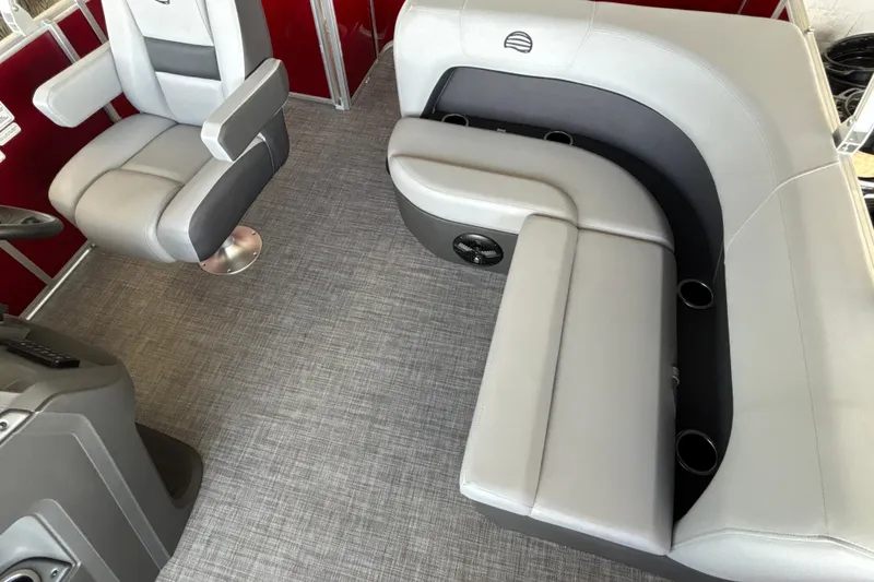 Slide: The Image of Interior of 2026 Sun Tracker Party Barge 18 DLX with plush seating and modern design. - 19
