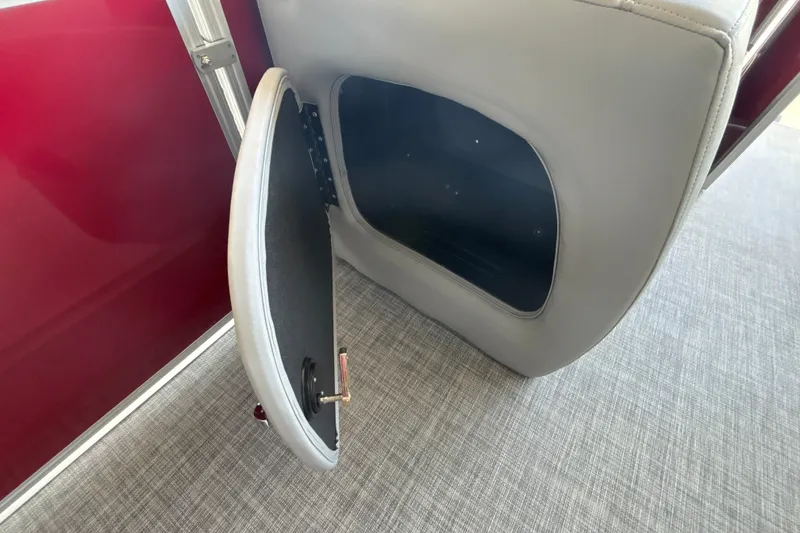 Slide: The Image of Open storage compartment on 2026 Sun Tracker Party Barge 18 DLX pontoon boat. - 34