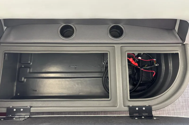 Slide: The Image of Storage compartment of 2026 Sun Tracker Party Barge 18 DLX with battery wiring. - 32