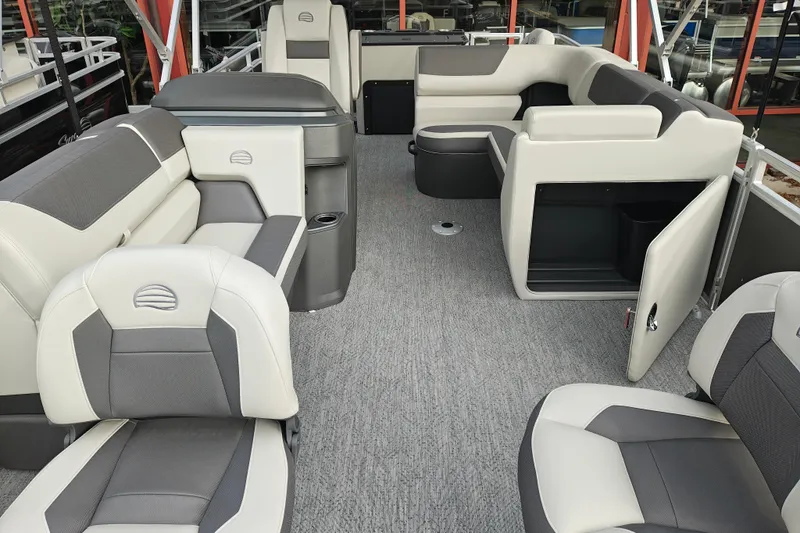 Slide: The Image of 2026 Sun Tracker Fishin' Barge 20 DLX interior with spacious seating and modern design. - 8