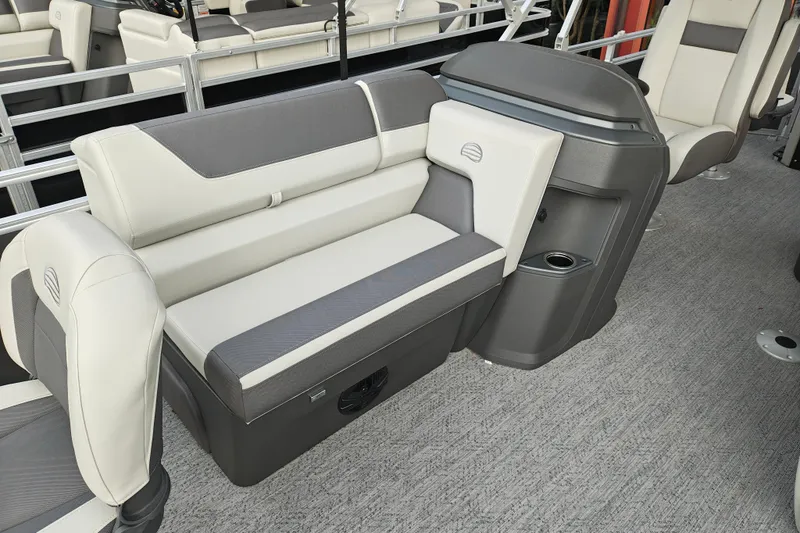 Slide: The Image of 2026 Sun Tracker Fishin' Barge 20 DLX interior with comfortable seating and modern design. - 10