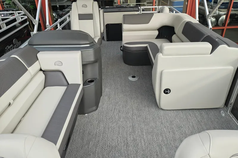 Slide: The Image of 2026 Sun Tracker Fishin' Barge 20 DLX interior with spacious seating and modern design. - 9