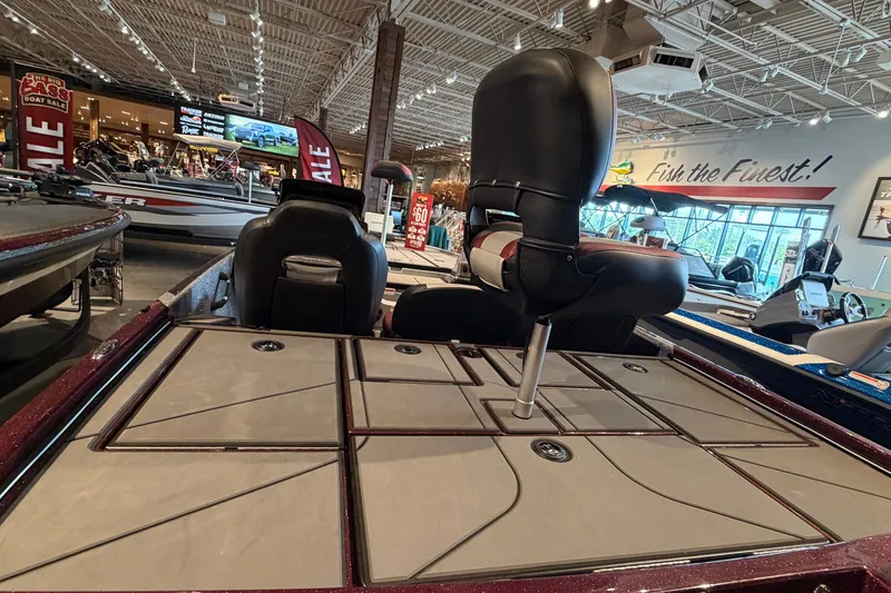 Slide: The Image of 2026 Nitro Z19 XL Pro boat interior at showroom, featuring seating and storage compartments. - 11