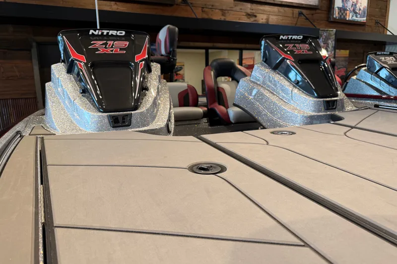 Slide: The Image of 2026 Nitro Z19 XL Pro boat with sleek design and glittering finish in showroom. - 9