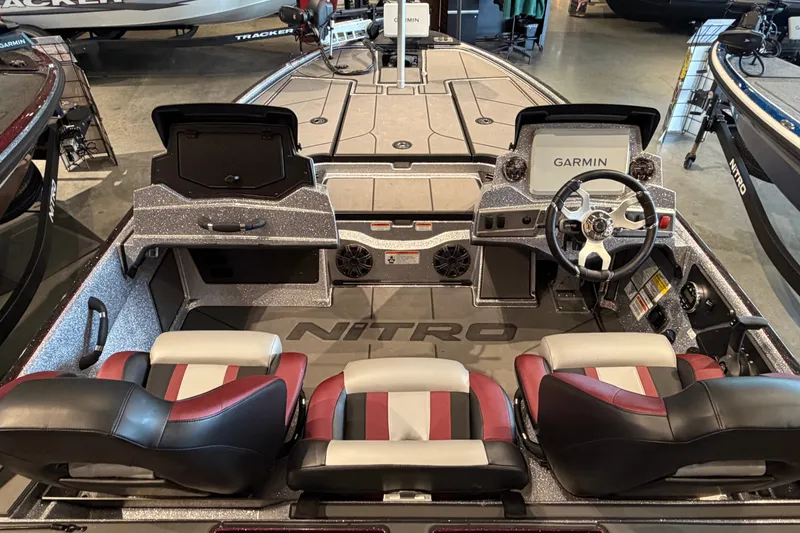 Slide: The Image of 2026 Nitro Z19 XL Pro boat interior with Garmin electronics and stylish seating. - 5