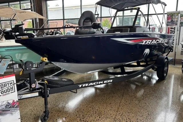 The Image of 2026 Tracker Pro Guide V-175 Combo boat on display in showroom. - 0