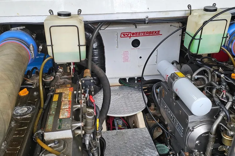 Slide: The Image of Engine compartment of a 2006 Formula 40 Performance Cruiser with Westerbeke generator. - 16
