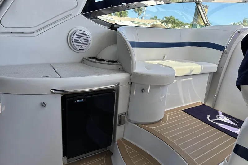 Slide: The Image of Interior of 2006 Formula 40 Performance Cruiser with white seating and wood flooring. - 7