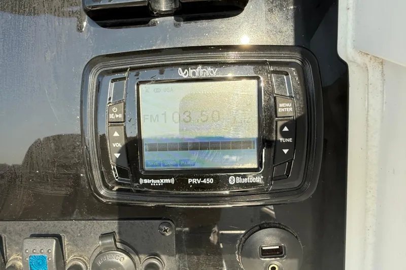 Slide: The Image of Infinity PRV-450 marine stereo on 2017 Sea Hunt Gamefish 25 boat dashboard. - 16