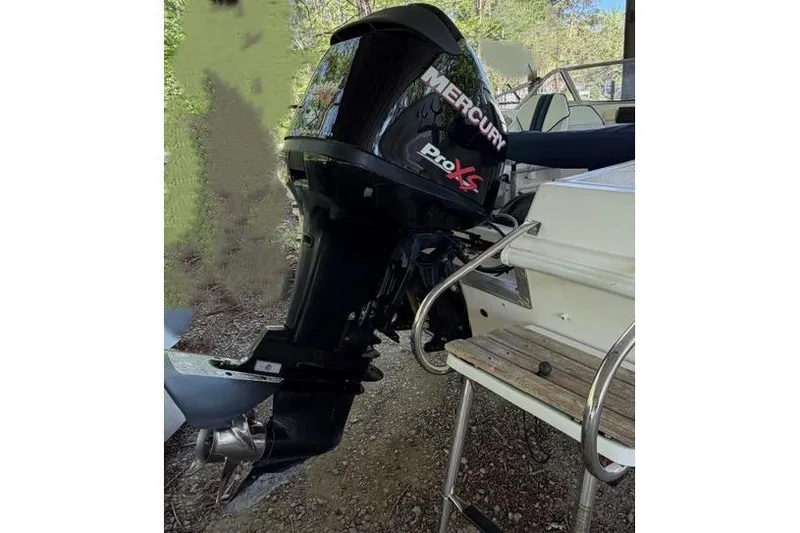 Slide: The Image of Outboard motor on a 2001 Clearwater 2200 Dual Console boat, featuring Mercury Pro XS engine. - 6
