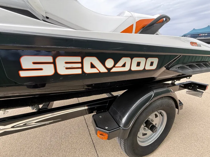 Slide: The Image of 2012 Sea-Doo GTI 130 on trailer, close-up of logo. - 3