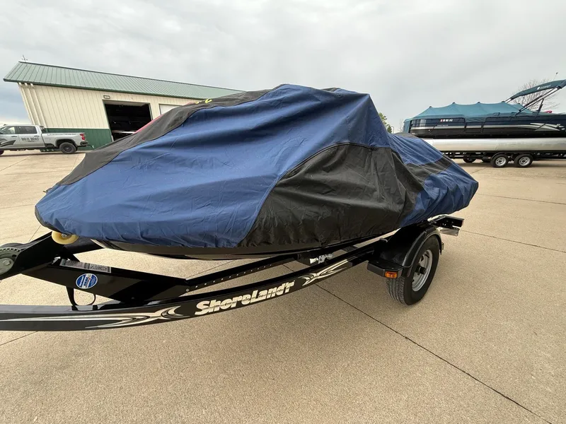 Slide: The Image of Covered 2012 Sea-Doo GTI 130 on a trailer. - 9