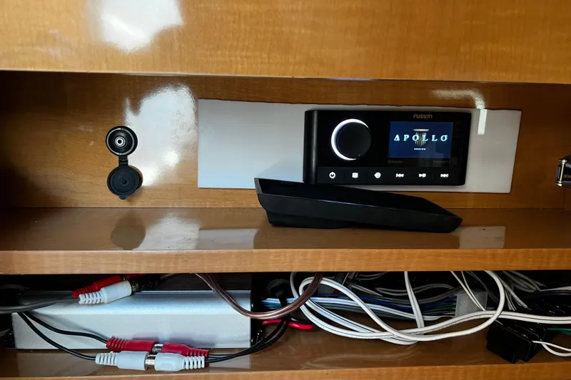 Slide: The Image of Fusion Apollo stereo system in 2009 Rinker 340 Express Cruiser, with wiring and connectors. - 13