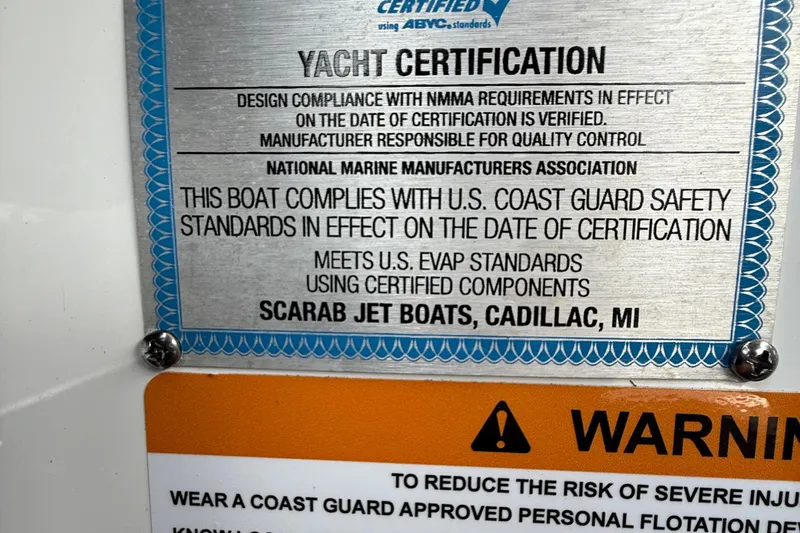 Slide: The Image of Yacht certification plaque for 2022 Scarab 285 ID, meeting U.S. Coast Guard safety standards. - 19