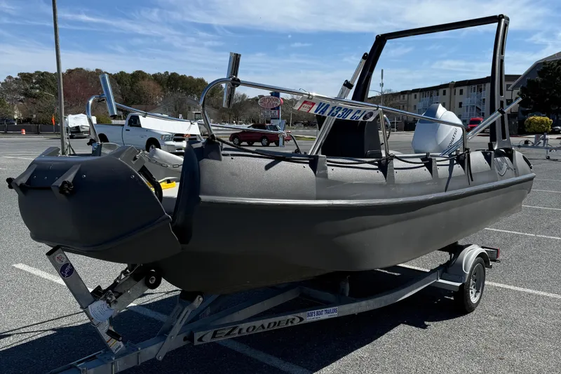 Slide: The Image of 2021 Whaly 445R boat on trailer in parking lot, sunny day. - 4