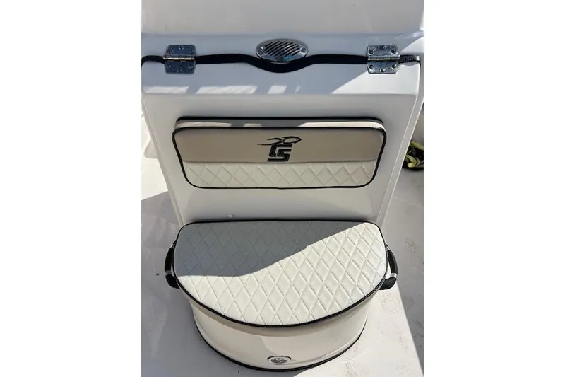 Slide: The Image of 2022 Carolina Skiff 21 LS boat seat with quilted cushion and storage compartment. - 7