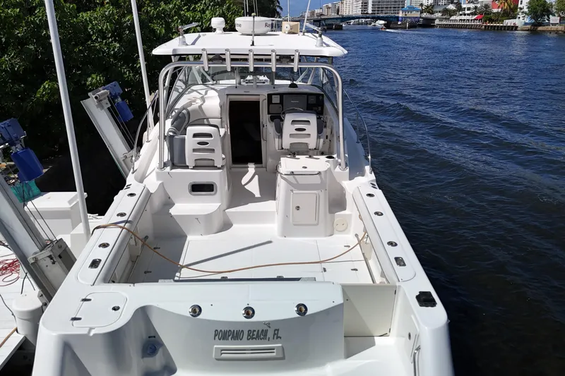 Slide: The Image of 2005 Boston Whaler 305 Conquest boat docked at Pompano Beach, Florida. - 3