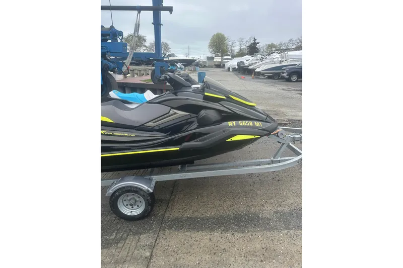 Slide: The Image of 2023 Yamaha WaveRunner FX Cruiser SVHO on trailer, parked in marina lot. - 3