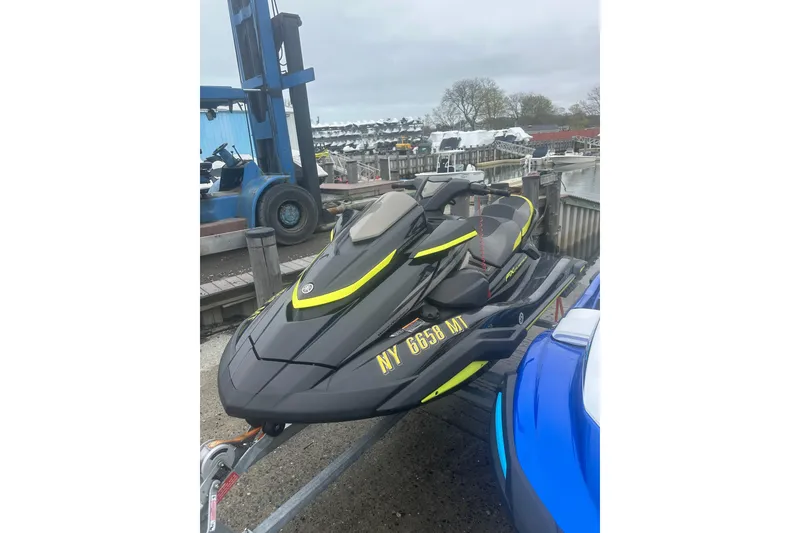 Slide: The Image of 2023 Yamaha WaveRunner FX Cruiser SVHO parked at a marina. - 6