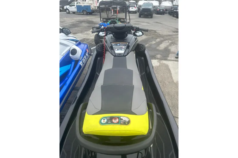 Slide: The Image of 2023 Yamaha WaveRunner FX Cruiser SVHO in a parking lot, showcasing its sleek design. - 9
