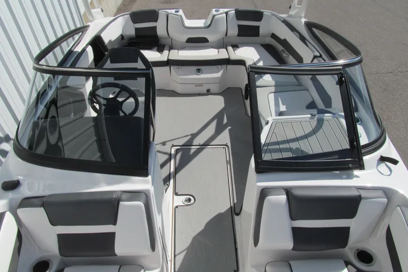 Slide: The Image of 2024 Yamaha Boats AR195 interior with sleek seating and modern design. - 10