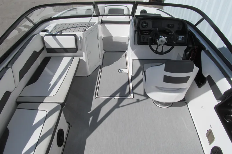 Slide: The Image of 2024 Yamaha Boats AR195 interior with sleek seating and modern dashboard design. - 5