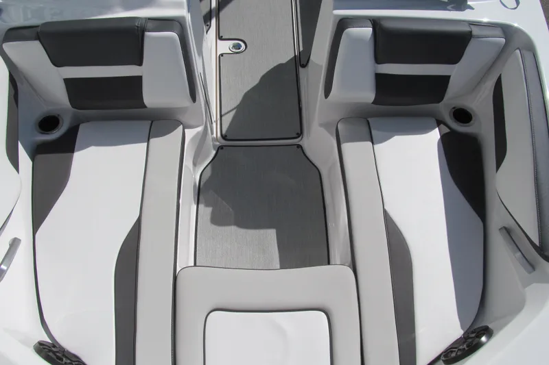 Slide: The Image of 2024 Yamaha Boats AR195 interior seating with sleek, modern design and comfortable upholstery. - 9