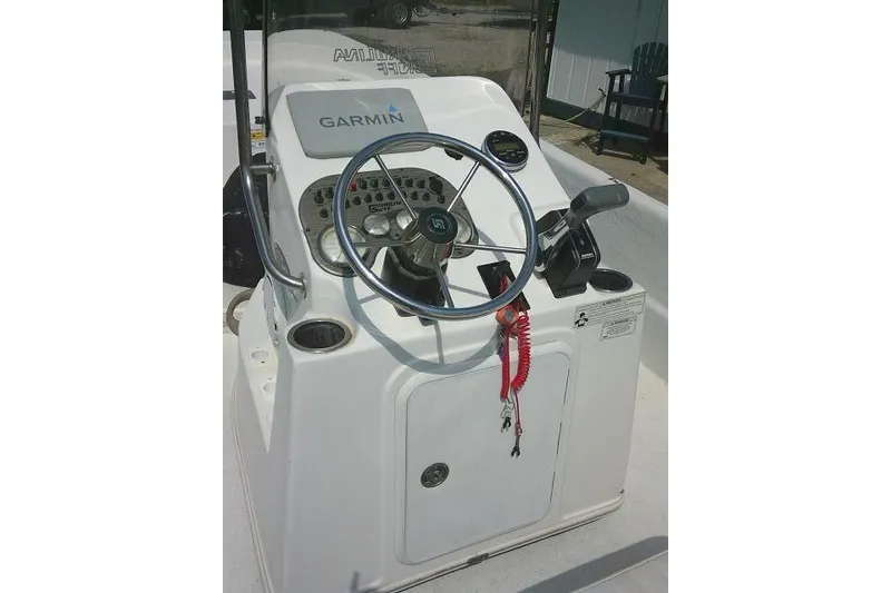 Slide: The Image of 2015 Carolina Skiff 2180 DLX boat console with Garmin navigation system. - 16