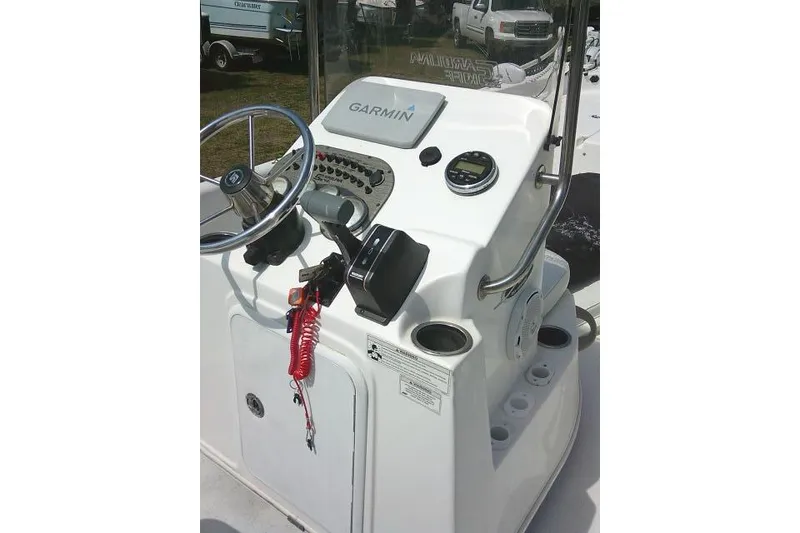 Slide: The Image of Console of a 2015 Carolina Skiff 2180 DLX with Garmin navigation system. - 21