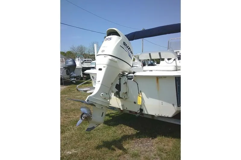 Slide: The Image of 2015 Carolina Skiff 2180 DLX with Suzuki outboard motor on display. - 7