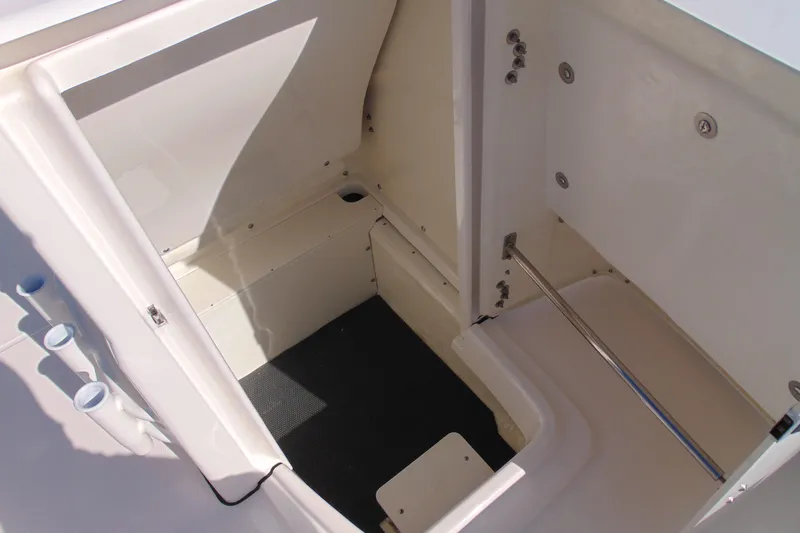 Slide: The Image of 2025 Robalo R180 Center Console storage compartment, featuring spacious interior and secure fittings. - 13